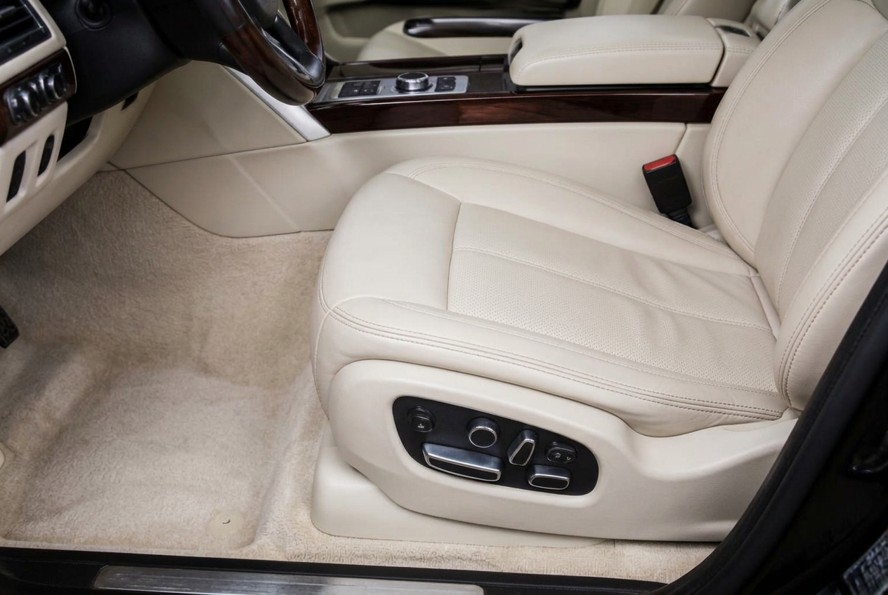 The same cream leather luxury car interior renewed after deep detailing
